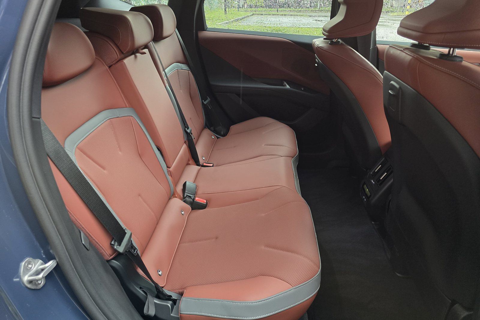 BMW iX3 rear seats showing the flat floor and rear passenger legroom