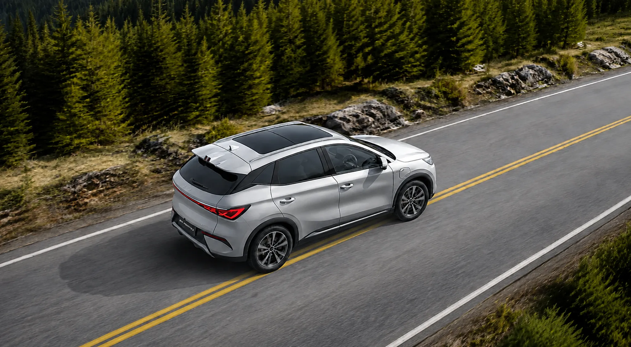 BYD Atto 3 Evo viewed from above on a mountain road