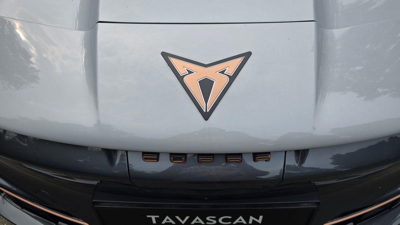 Copper Cupra badge on the bonnet of the Tavascan above the TAVASCAN lettering