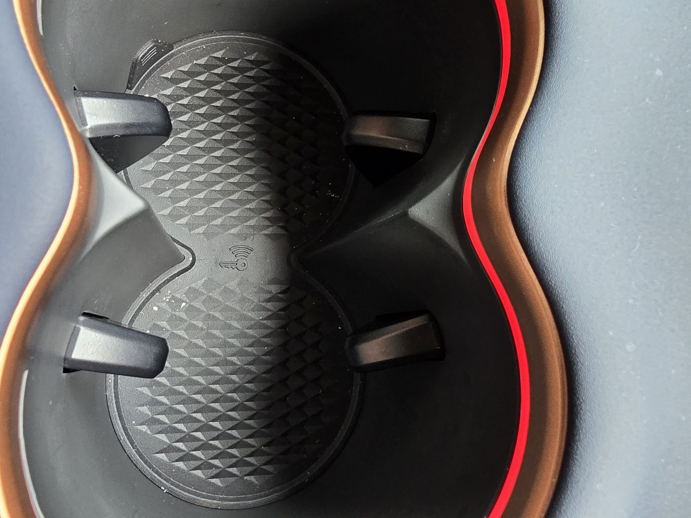 Cupra Tavascan cup holder with a red light ring around its rim