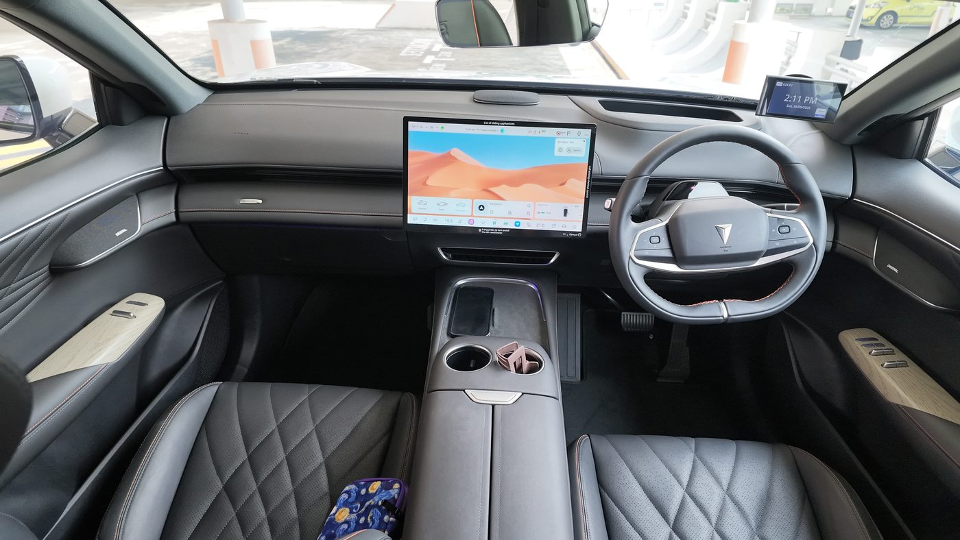 Deepal S07 dashboard with quilted black seats, a 15.6-inch centre screen and no instrument cluster behind the wheel