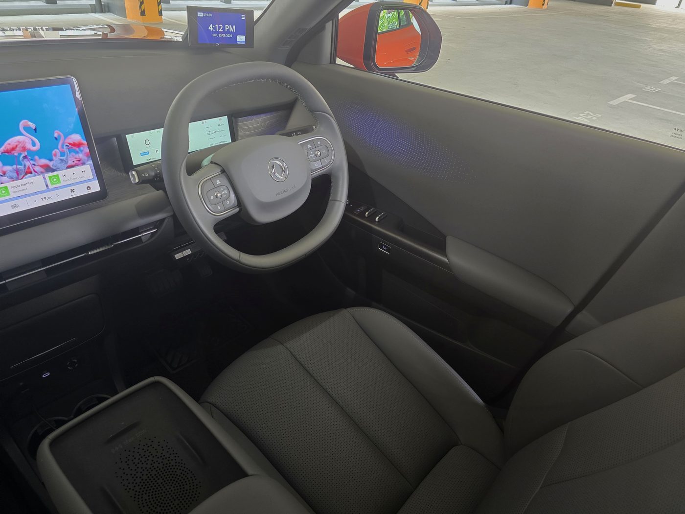 The Dongfeng Vigo driver display showing an average consumption of 14.4 kWh per 100 km on the trip computer