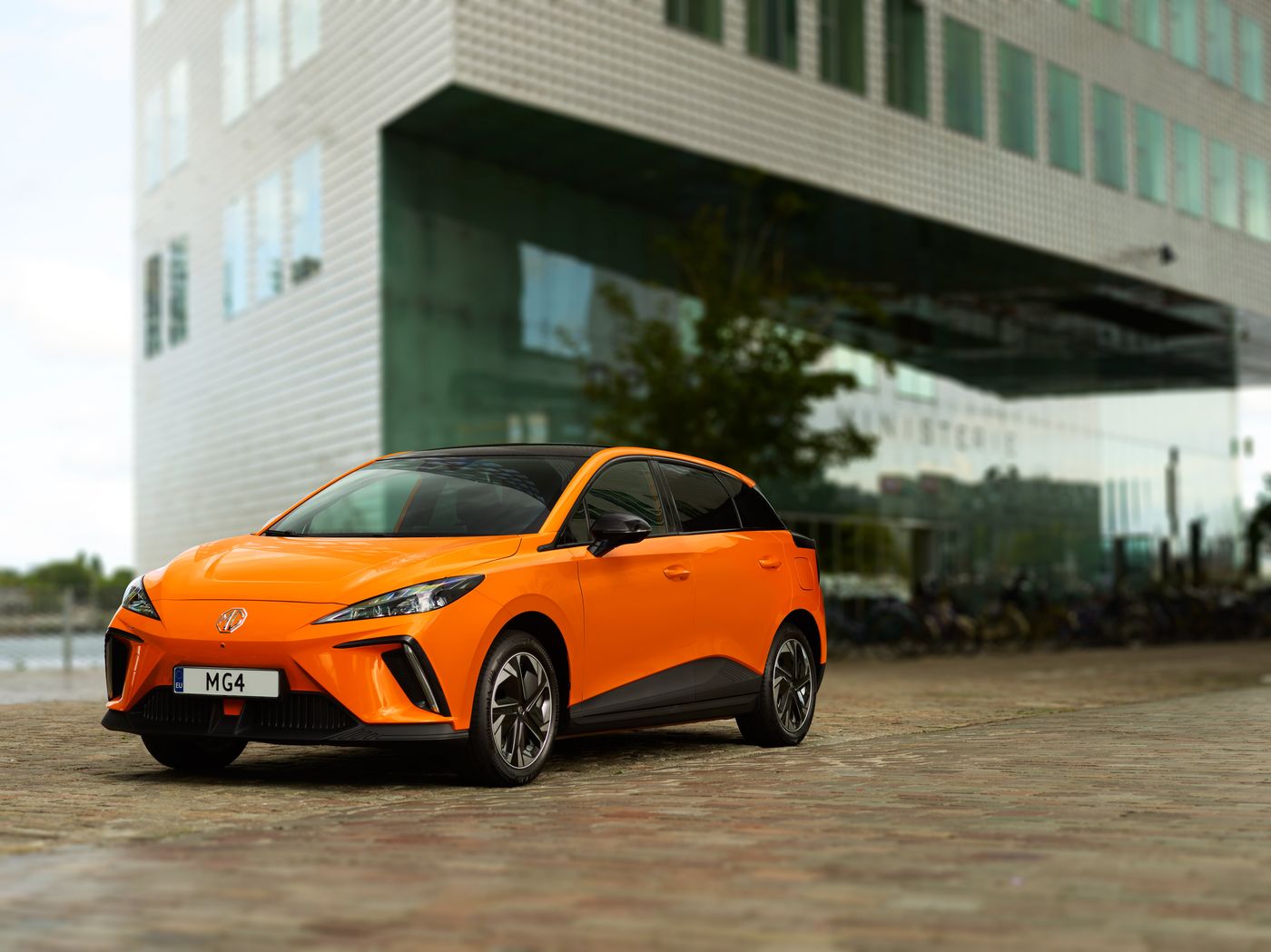 MG4 in Volcano Orange, front three-quarter view