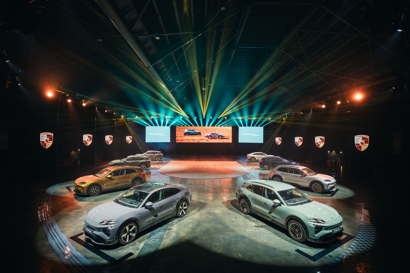 The Porsche Cayenne Electric range on stage at its Singapore launch at Singapore EXPO