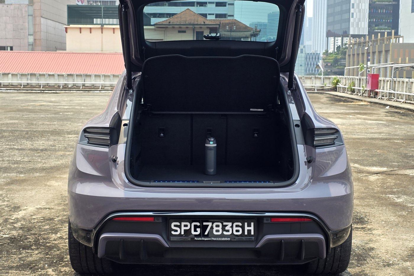 Porsche Macan Electric with the tailgate open showing the boot