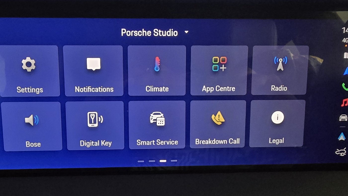 Porsche Macan Electric centre screen home page as set up on the test car, with Settings, Notifications, Climate, App Centre, Radio, Bose, Digital Key, Smart Service, Breakdown Call and Legal tiles