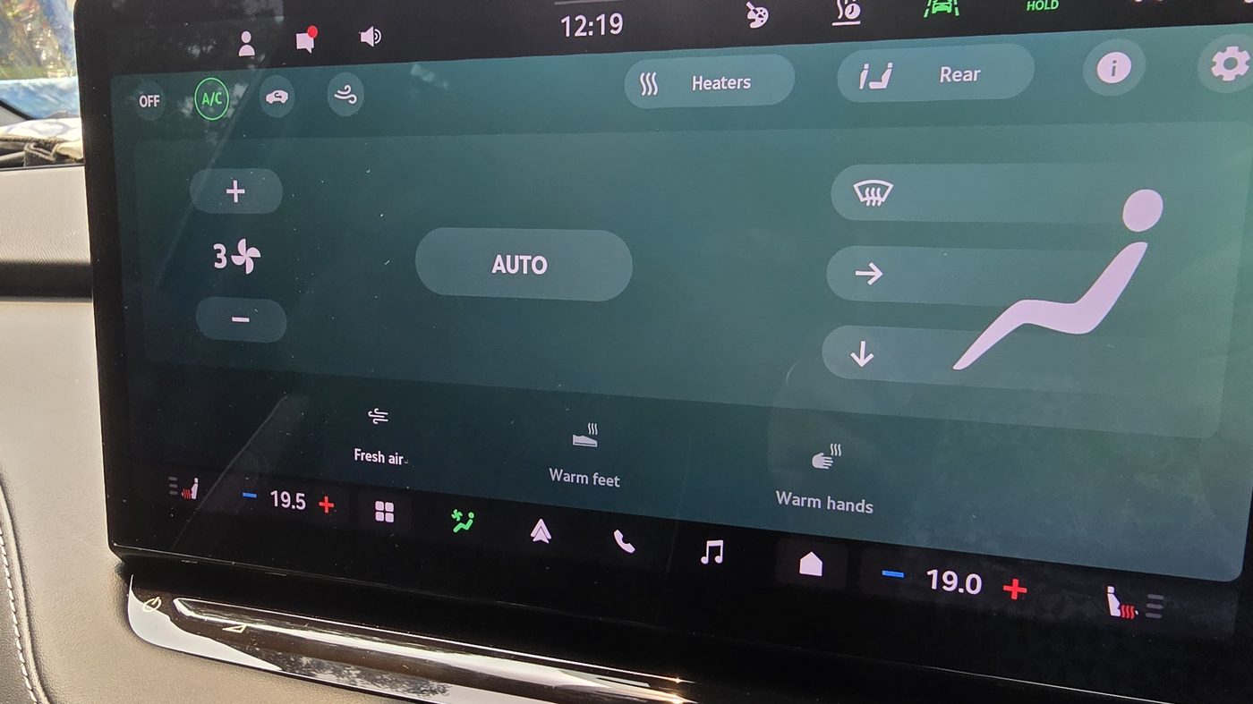 Skoda Enyaq climate screen showing the Auto setting and airflow direction controls