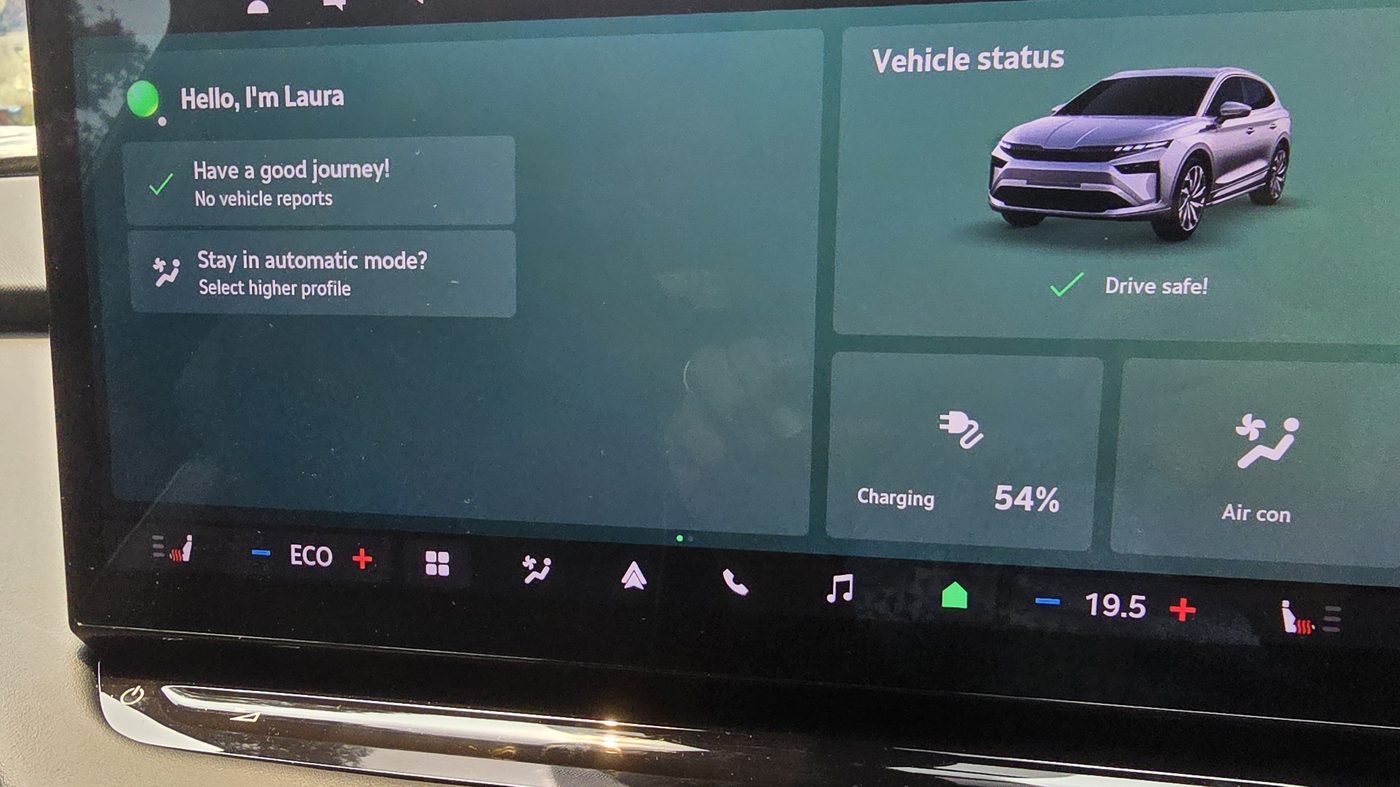 Skoda Enyaq centre screen home page with the Laura assistant, vehicle status and a 54 per cent charge tile