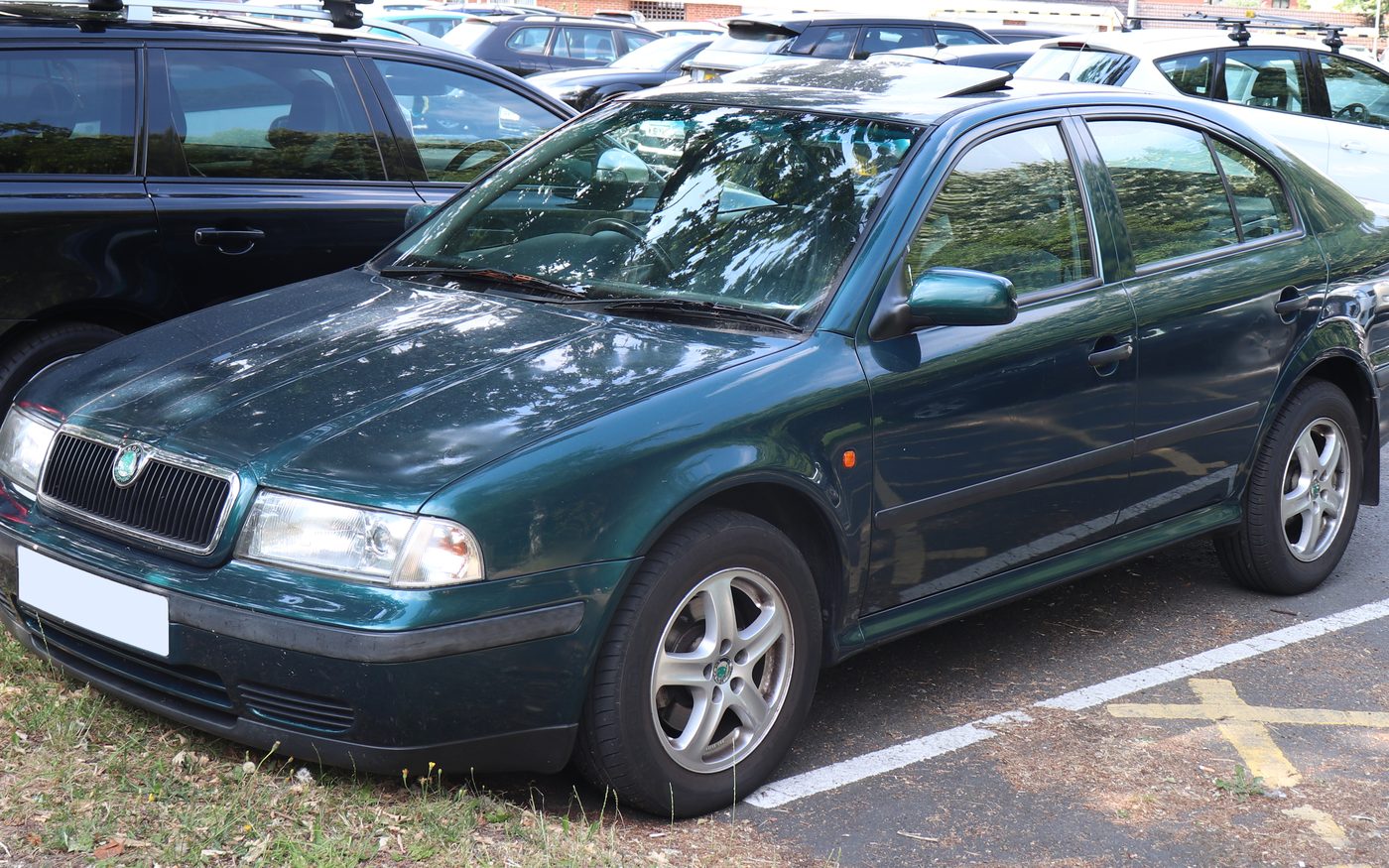 A dark green first-generation Škoda Octavia saloon