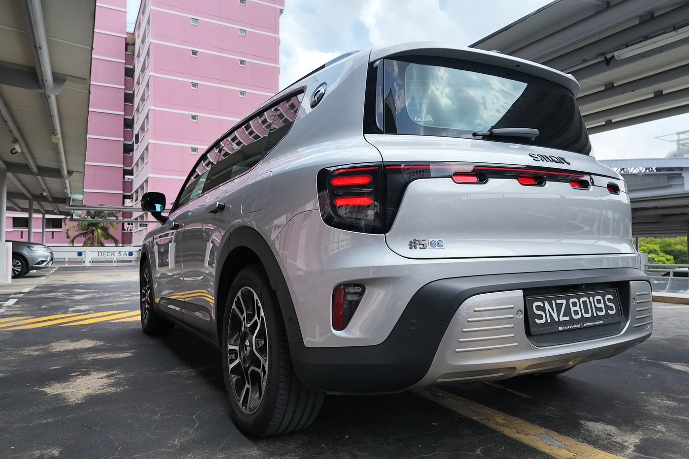 smart #5 Pro rear three-quarter on the carpark deck showing the full-width tail light