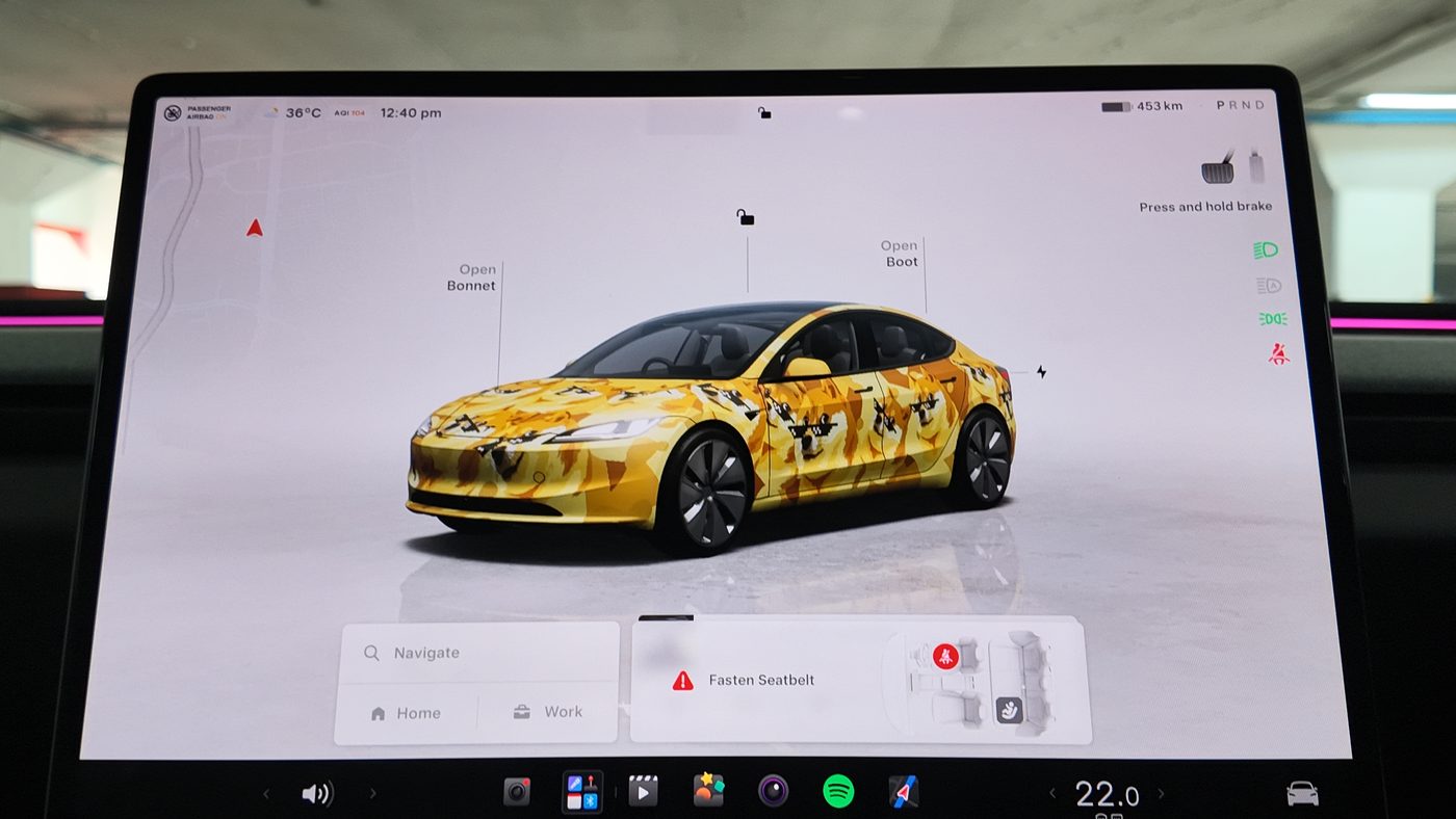 Tesla Model 3 15.4-inch centre screen showing the car avatar in a custom wrap