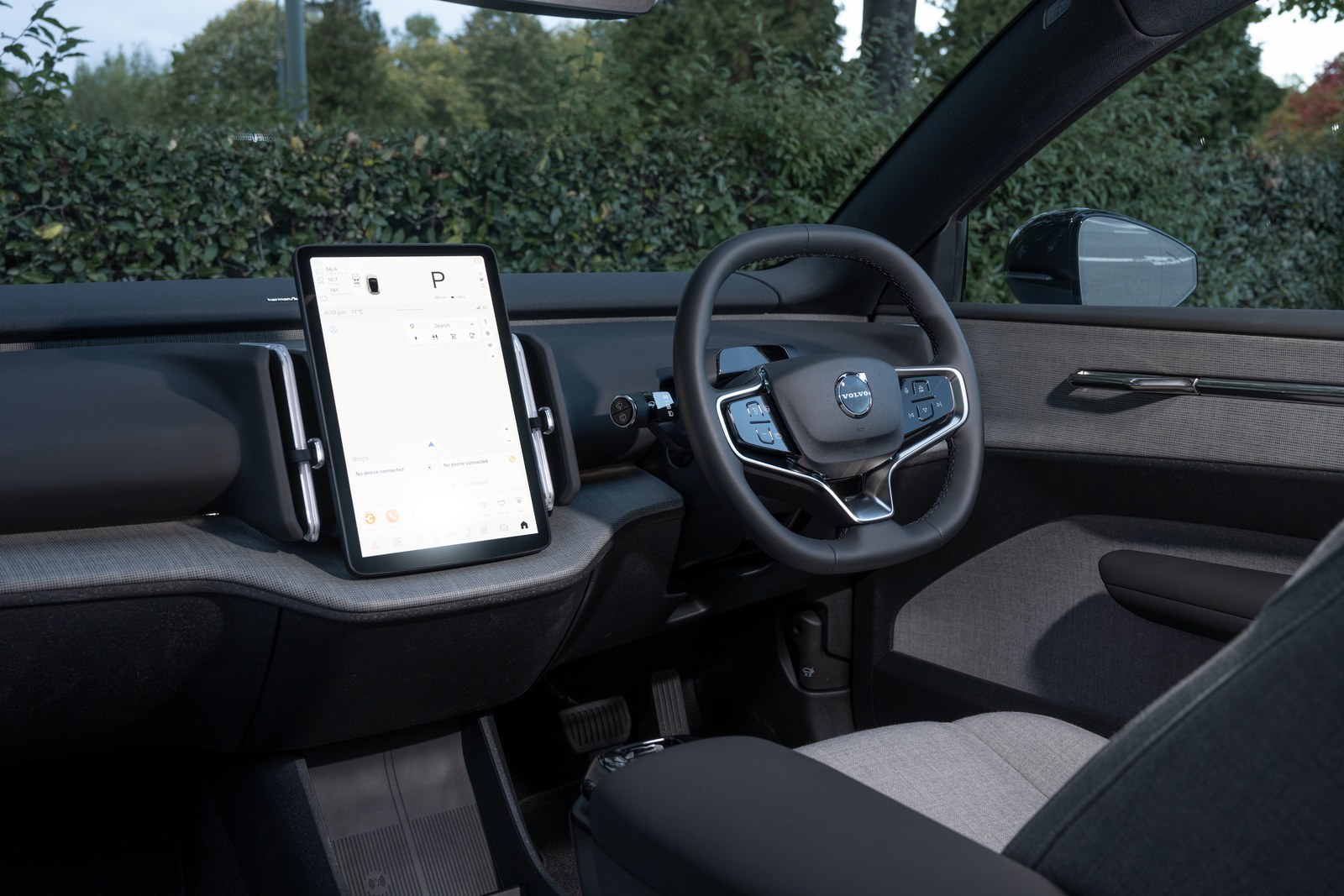Volvo EX30 interior: portrait touchscreen, steering wheel and dashboard