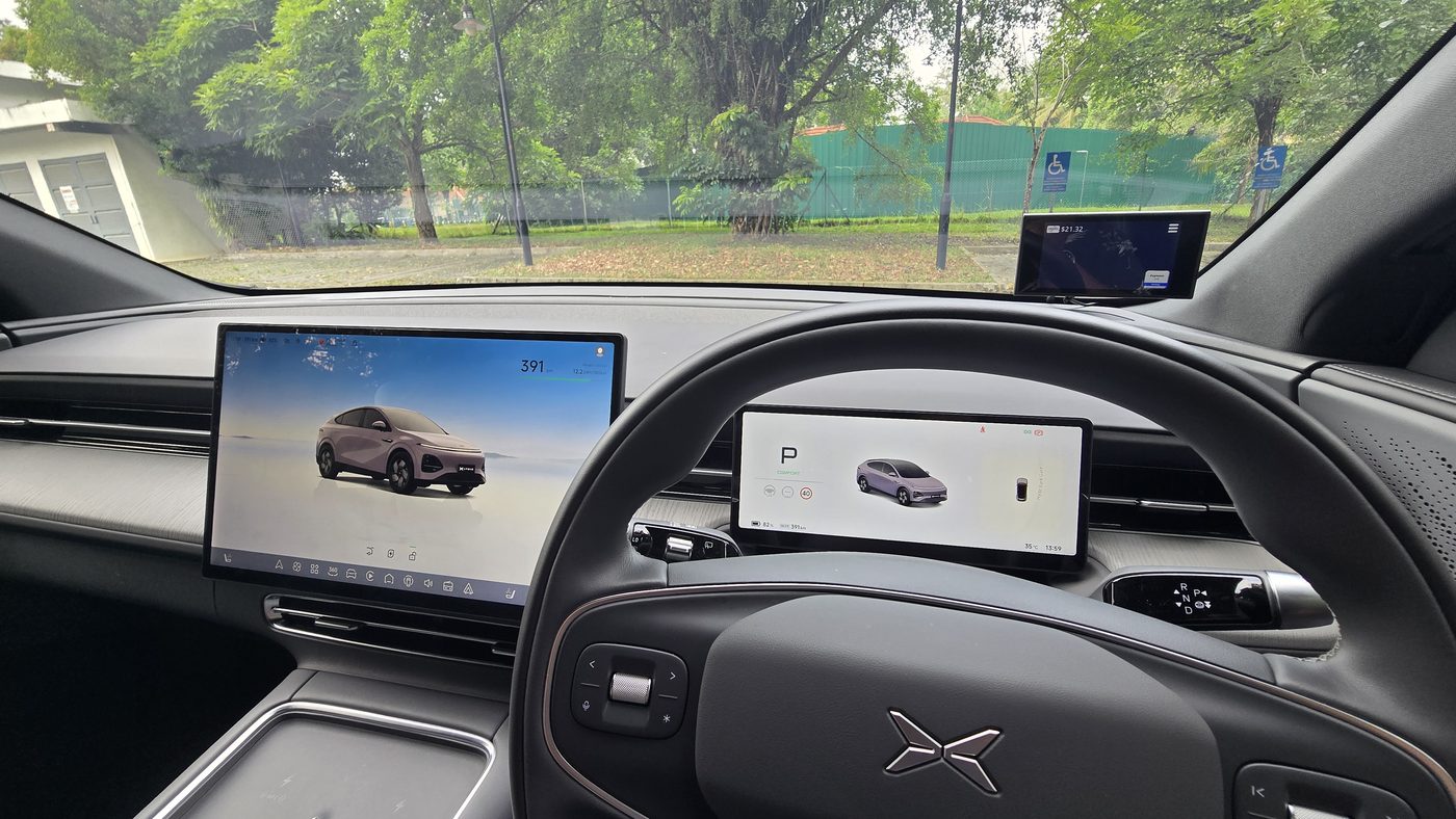 XPENG G6 Air driver's view with the steering wheel, instrument cluster and main screen