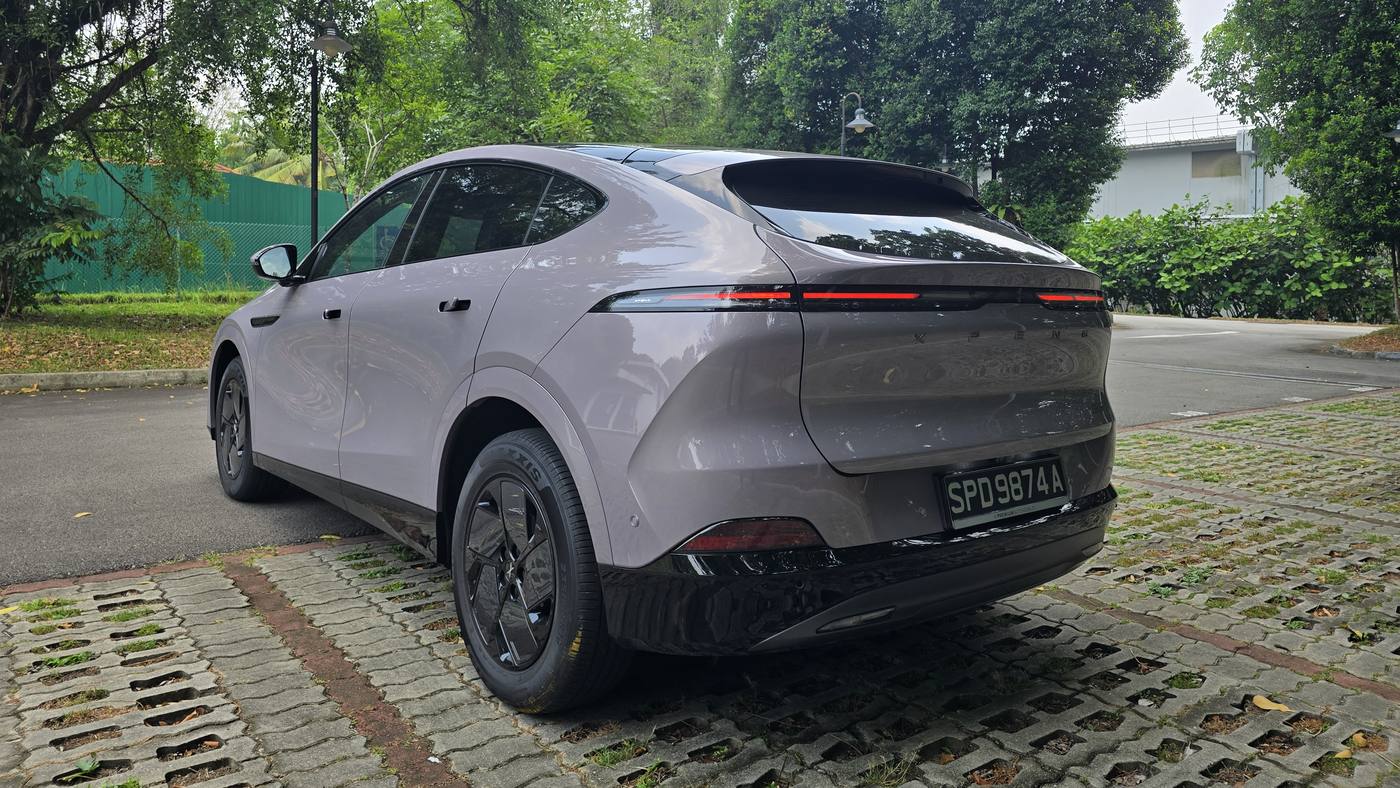 XPENG G6 Air rear three-quarter view showing the ducktail spoiler and light bar