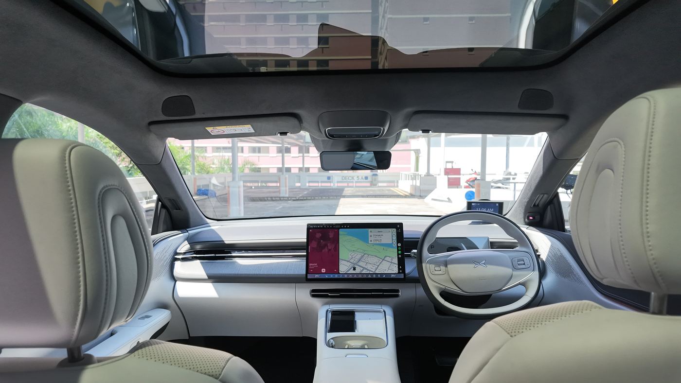 XPENG G6 cabin viewed from the rear seats through the panoramic glass roof