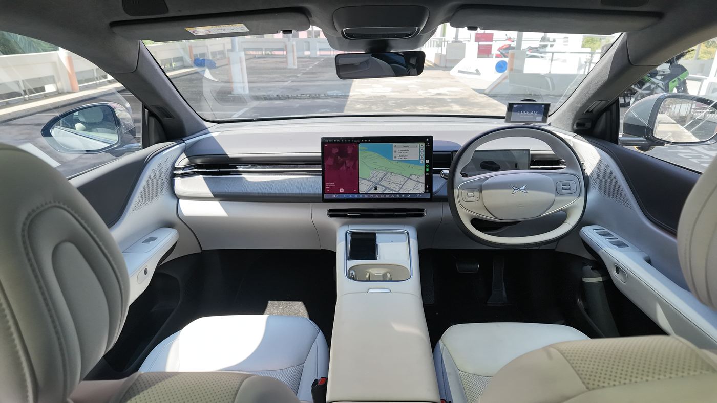 XPENG G6 dashboard in Light Grey with the 15.6-inch screen and two-spoke steering wheel