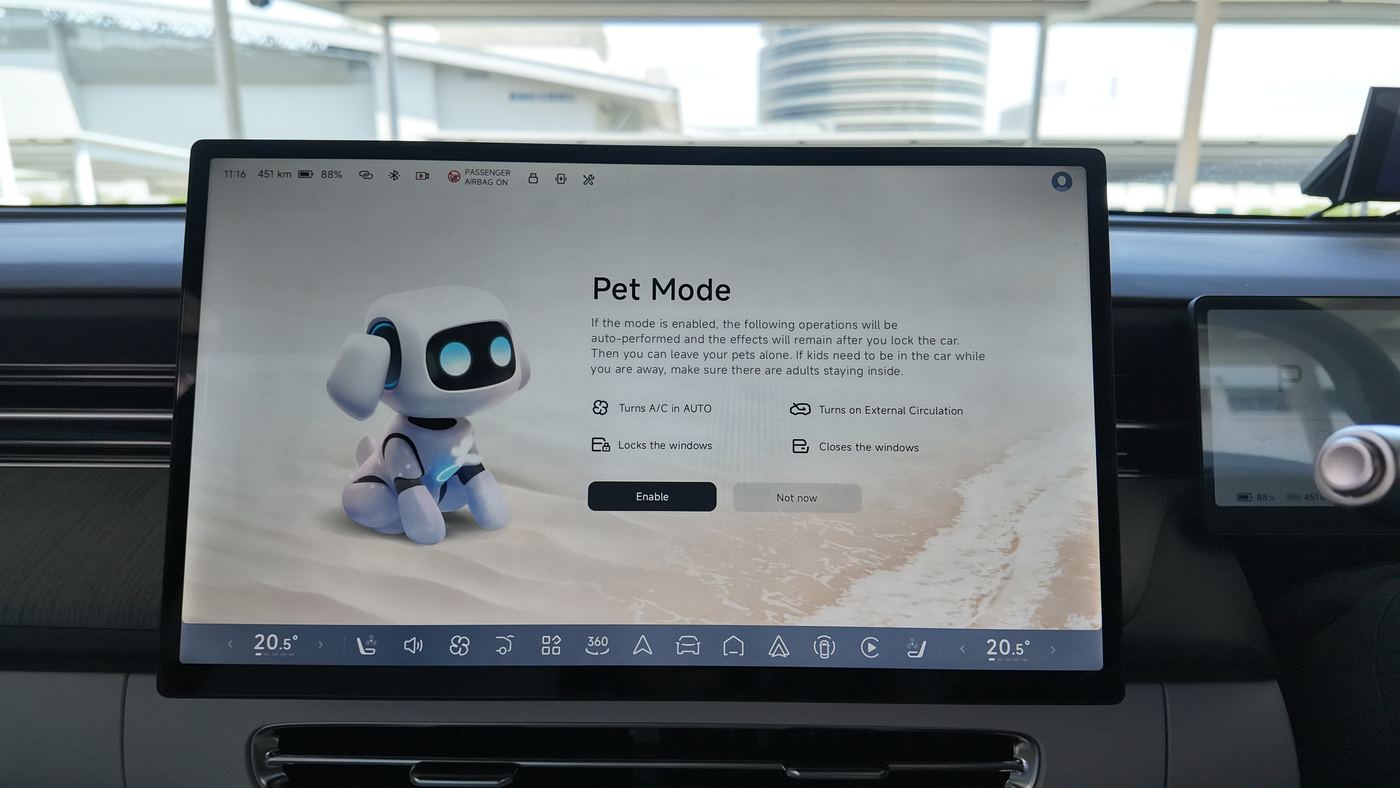 XPENG G6 Pet Mode screen with a cartoon robot dog