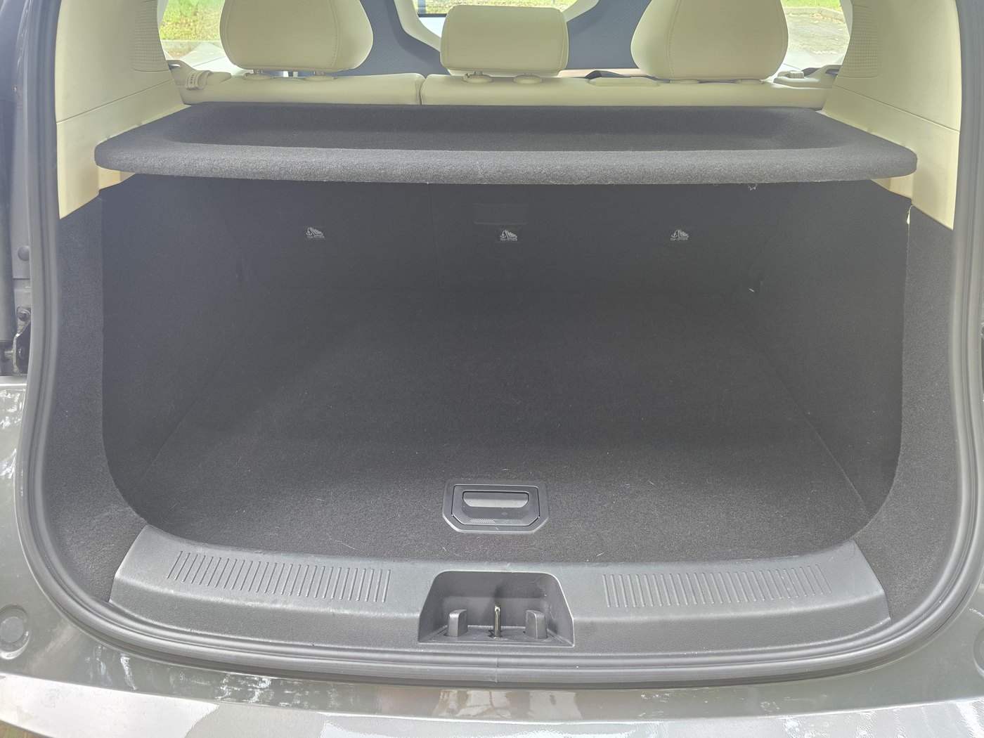 Zeekr X Urban boot with the tailgate open, showing the small flat load area